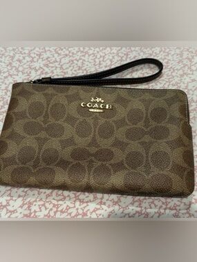 Coach Brown Signature Pattern Wristlet with Dark Brown Strap